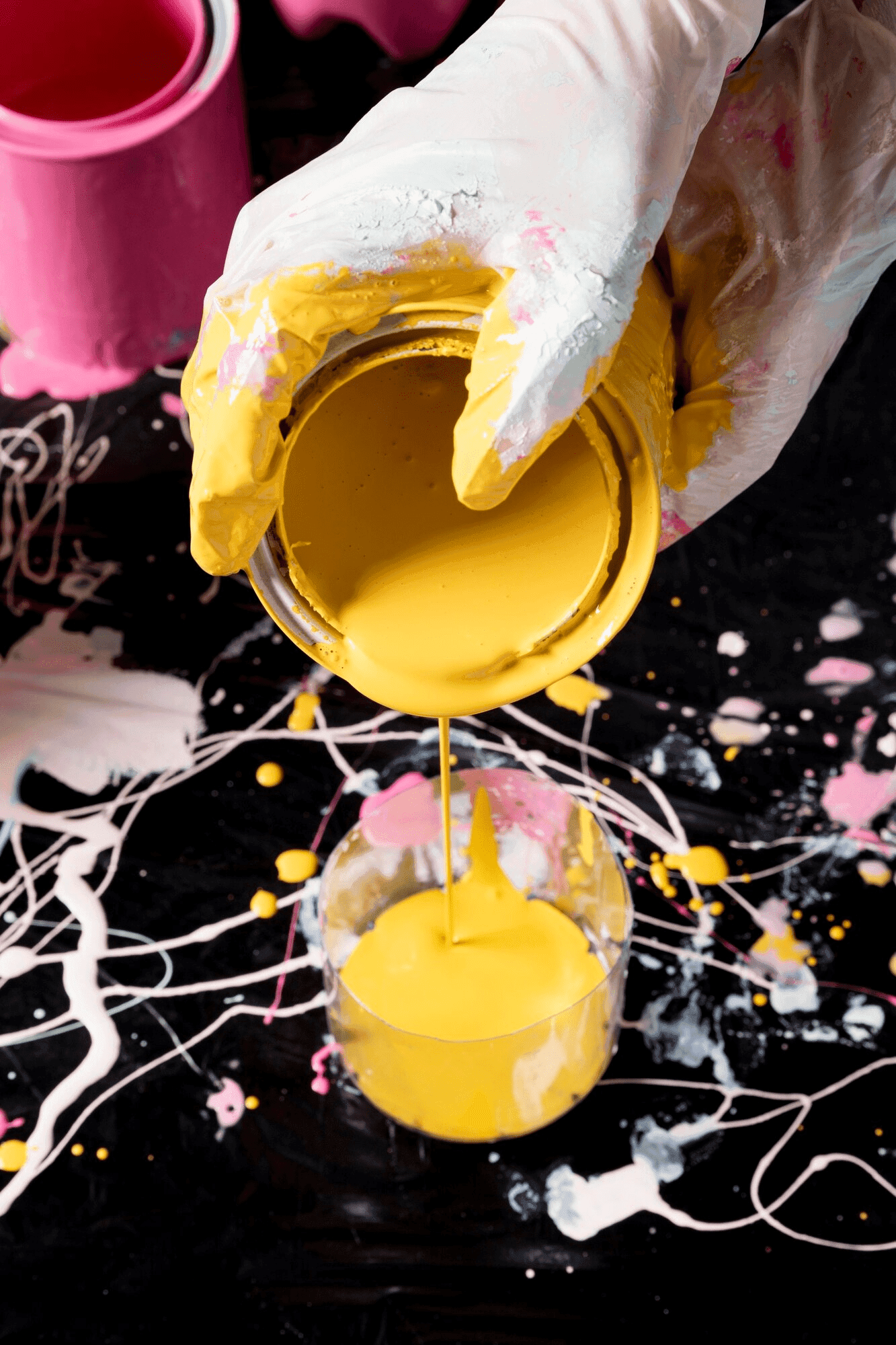 Paint being poured from container