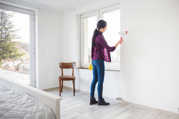 Modern apartment interior painting with clean white walls and professional finish