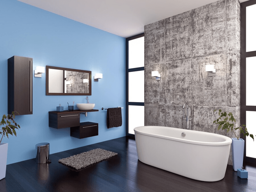Modern bathroom interior with blue walls and contemporary design elements